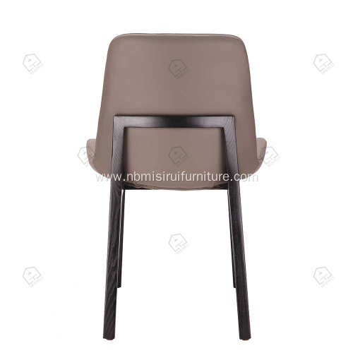 Brown faux leather armless Ventura chairs